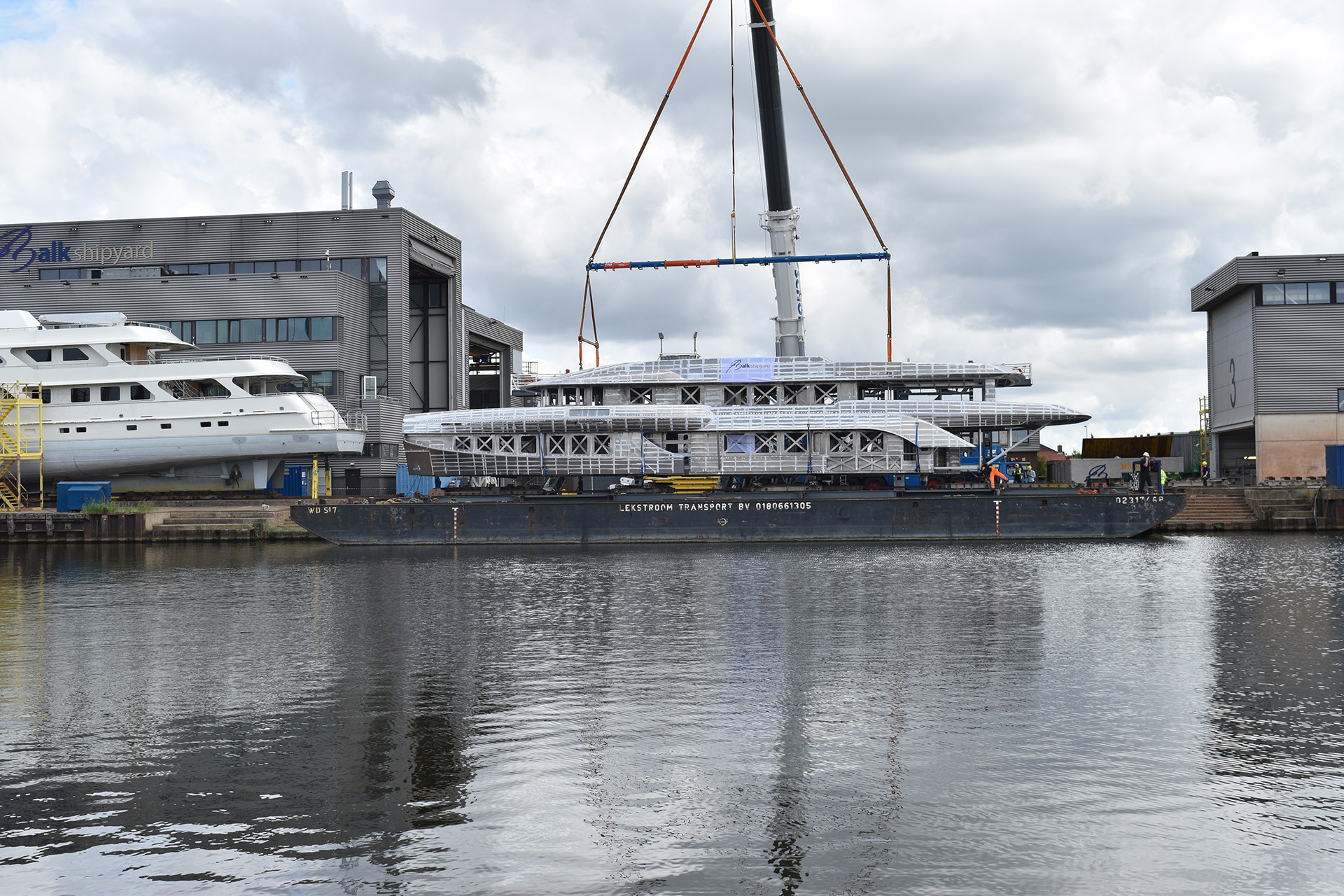 Construction for 50M+ superyacht on transport to the United States to be finished into a modern superyacht.