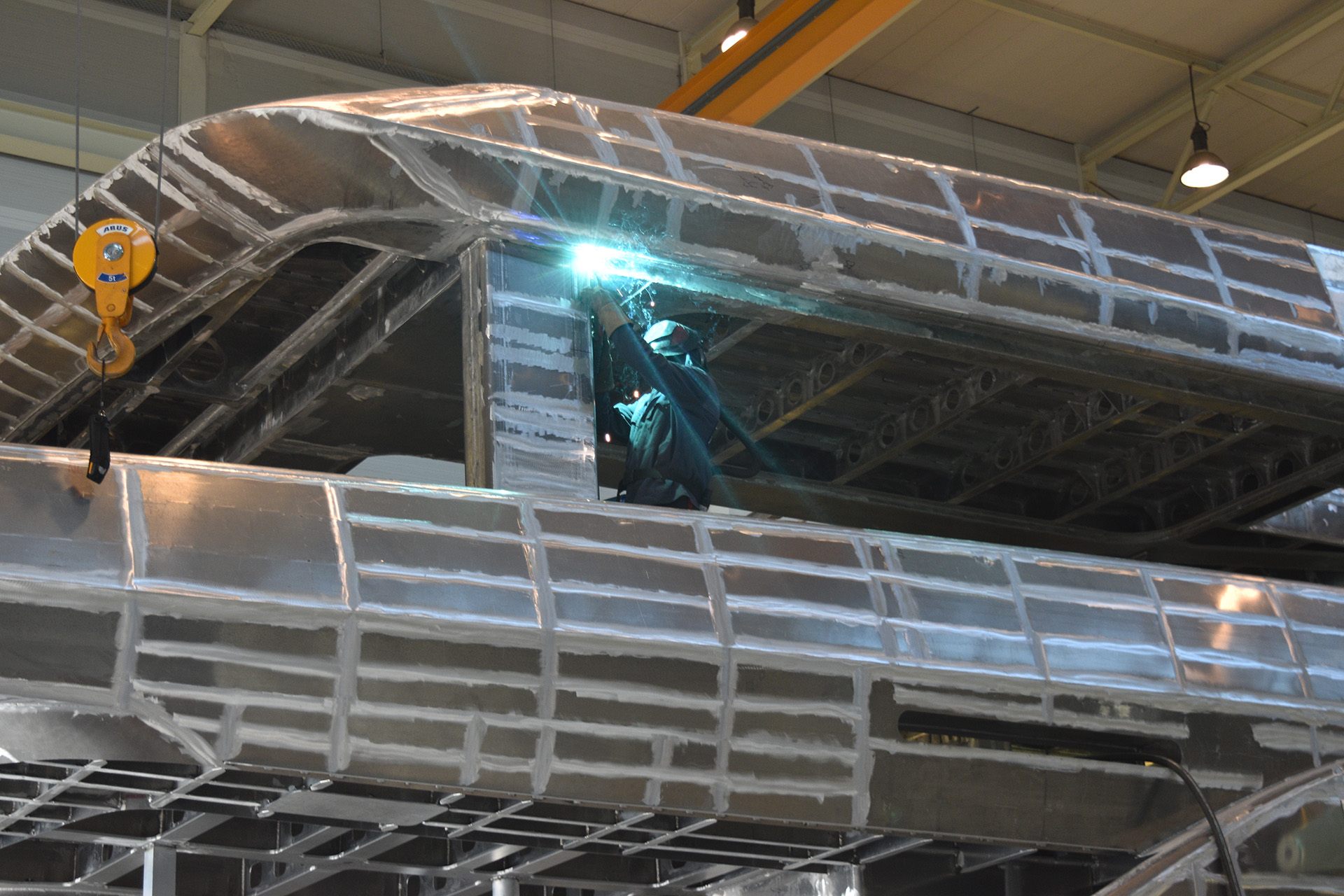 Welding on aluminium construction for 50M+ superyacht at Balk Shipyard.