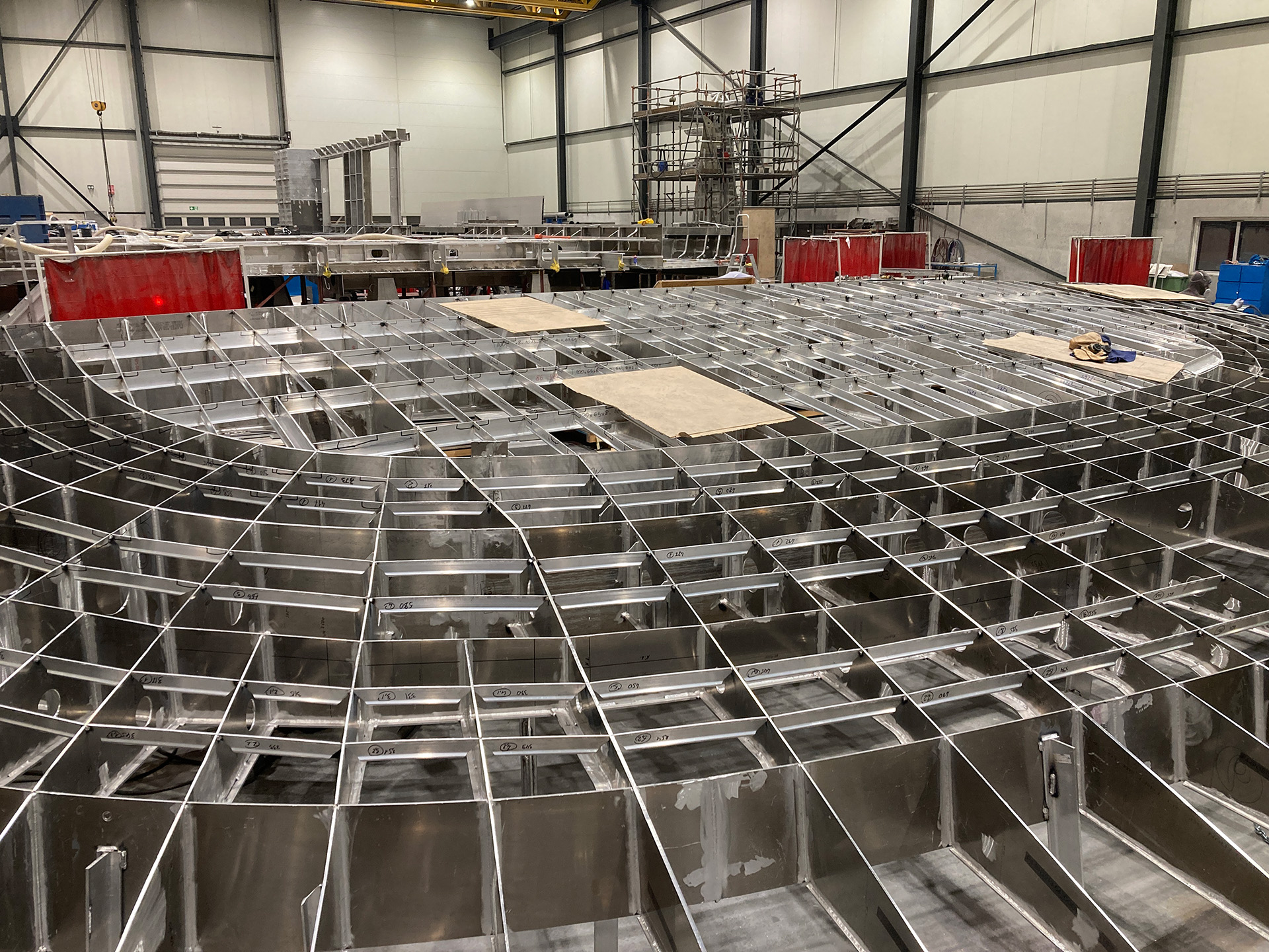Works on alumunium superstructure for 100M+ superyacht.